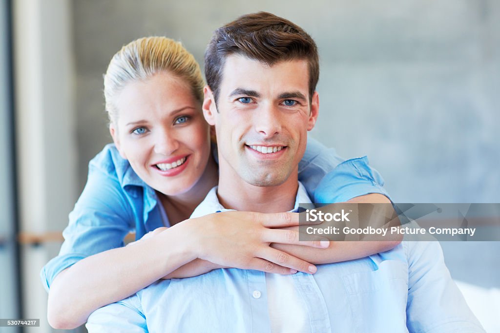 No words can explain true love Portrait of a happy young couple at home 2015 Stock Photo