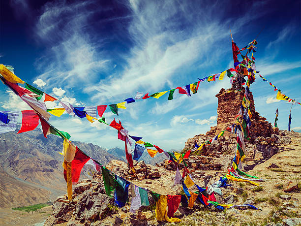 Buddhist prayer flags in Himalayas Vintage retro effect filtered hipster style image of Buddhist prayer flags (lungta) in Spiti Valley, Himachal Pradesh, India himachal pradesh photos stock pictures, royalty-free photos & images