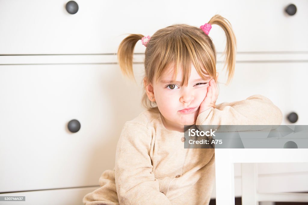 Angry little girl Angry Girl in her room Child Stock Photo