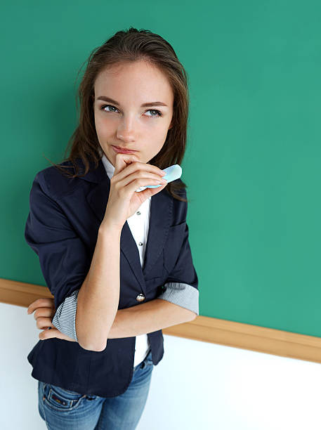 istock Photo beautiful student near blackboar 530748406
