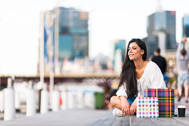 istock Young woman looking at view in Darling Harbour, Sydney 530748786
