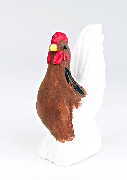 istock Painted ceramics incomplete chicken by kid isolated on white background 530749112