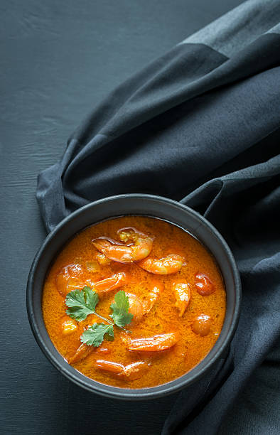 istock Bowl of thai yellow curry with seafood 530749438