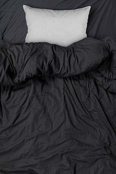 studio shot of bedding sheets and  pillow