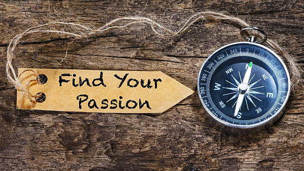Find your passion  motivation phrase handwriting on label with Find your passion - motivation phrase handwriting on label with compass passion stock pictures, royalty-free photos & images
