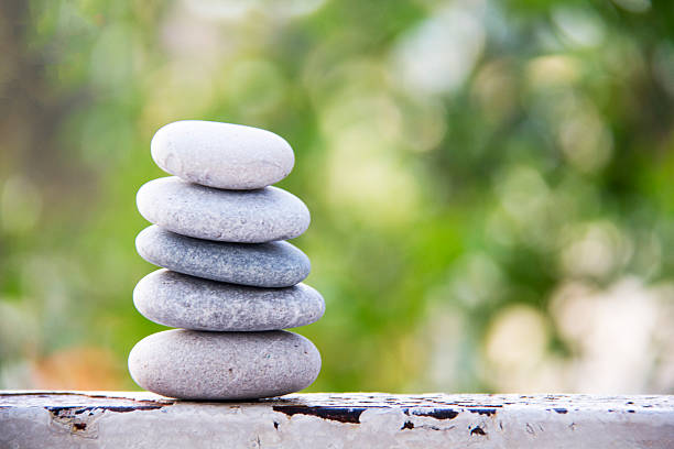 istock Stones balance vintage pebbles stack background 530750364