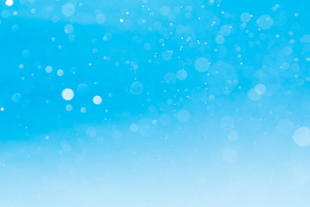istock abstract circular blue bokeh background 530750956