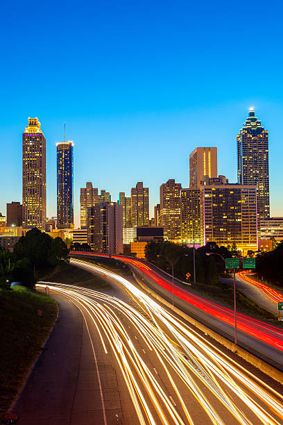 Traffic driving down the highway in Atlanta, Georgia at night.