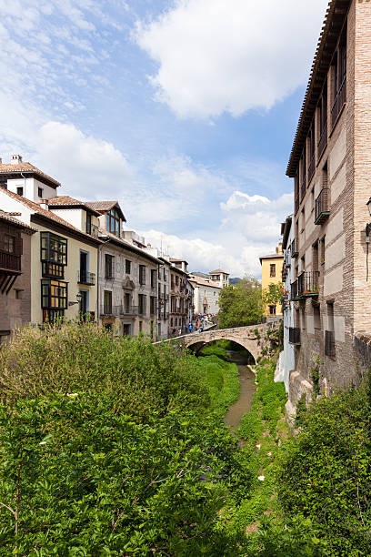 istock Darro river at the old town of Granada, Spain 530754462