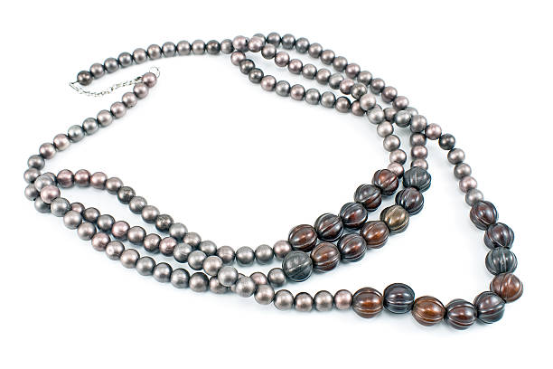 istock Necklace with gray beads isolated on white 530754659