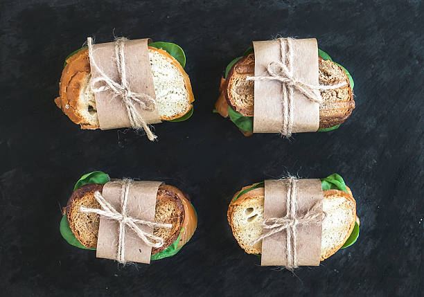istock Chicken and spinach sandwiches wrapped 530757555