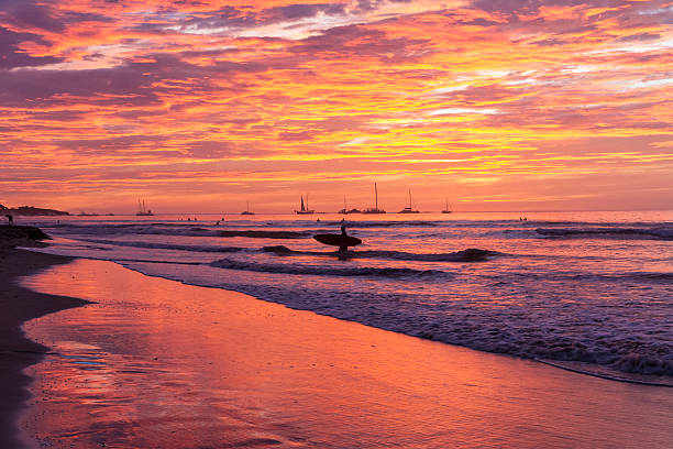 Surfboard Sunset Silhouette stock photo