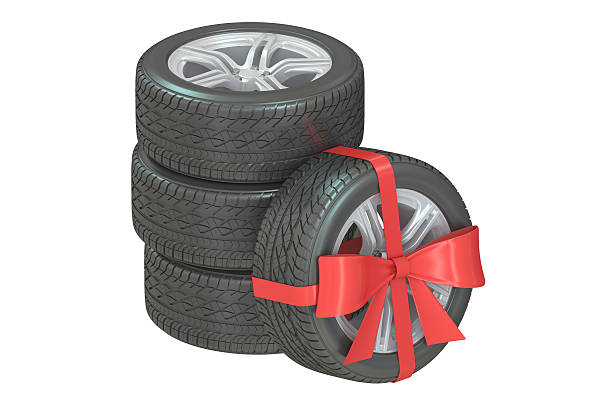 istock Gift set of wheels wrapped ribbon and bow, 3D rendering 530758290