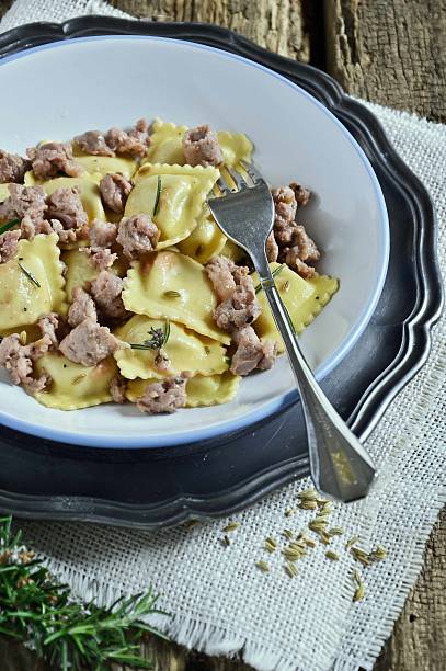 istock Stuffed pasta. Ravioli pasta with meat sauce 530759763