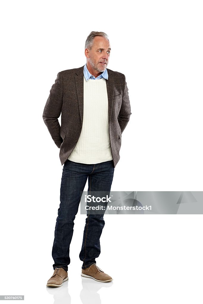 Relaxed mature man looking away at copyspace Studio shot of relaxed mature man looking away at copyspace on white background Men Stock Photo