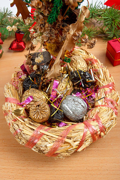 istock Christmas decoration with wicker basket with straw and colored n 530763951