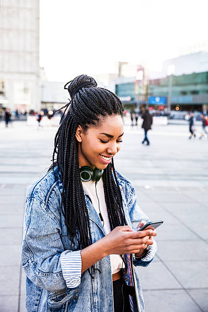 istock Young woman walking in Berlin - Alexanderplatz 530765958