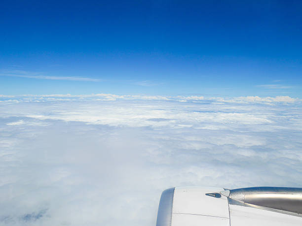 istock Aerial view of white clouds and blue sky 530766016