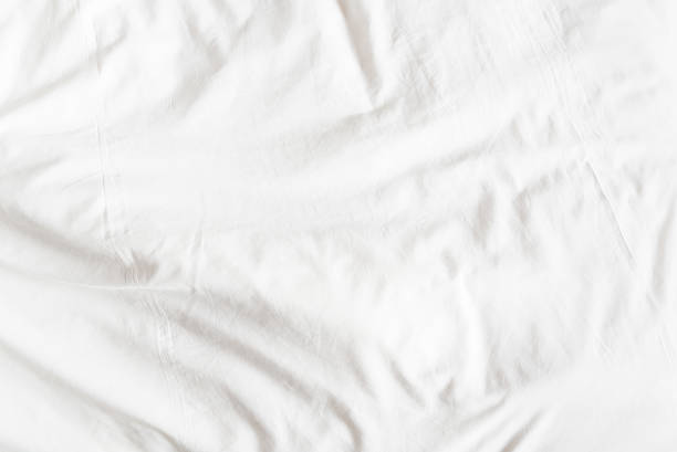 istock Top view of a messy bedding sheet after night sleep. 530766998