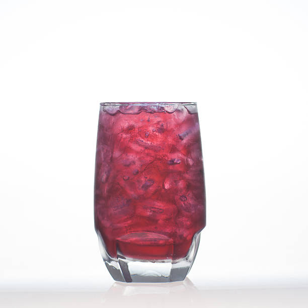 Grape flavor aerated drinks whit soda in glass isolated