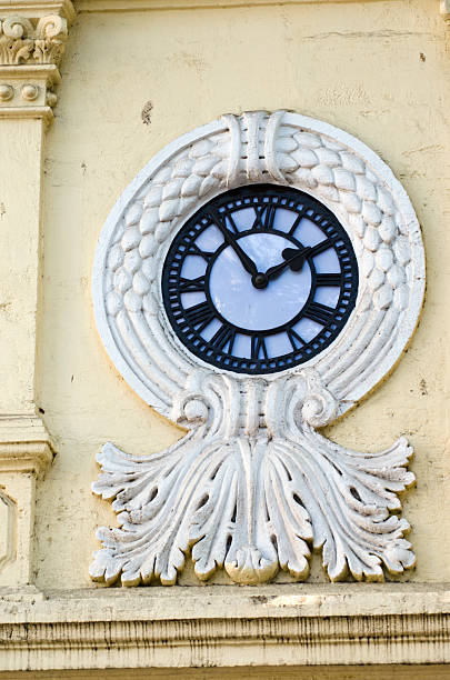 istock beautiful decorative clock on asia city  house wall 530769767