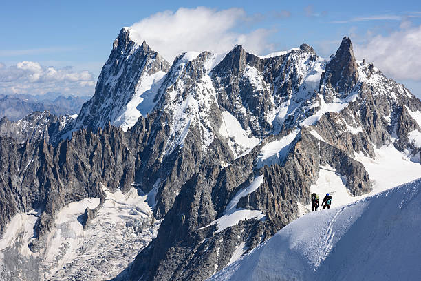 Grandes Jorasses, Dent du Géant, Mont Blanc Massif On the left side you can see the almost vertical 1000 m high northern face of the Grandes Jorasses (4208 m), one of the most difficult north faces of the Alps. On the right side the Dent du Géant (4013 m) is situated (Mont Blanc Massif, France). dent du geant stock pictures, royalty-free photos & images