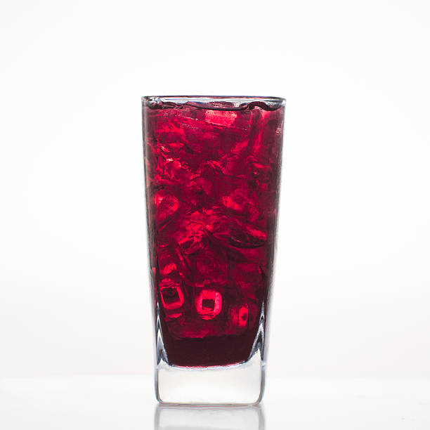 istock Sweet grape juice a fresh cold drink in glass isolated 530776733