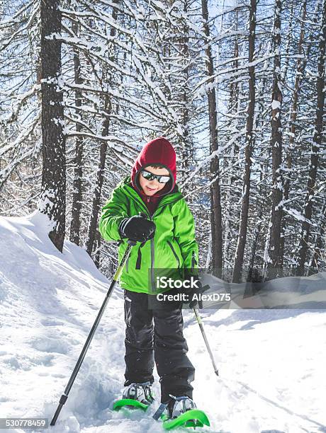 Kid Snowshoeing Stock Photo - Download Image Now - 2015, 6-7 Years, Activity