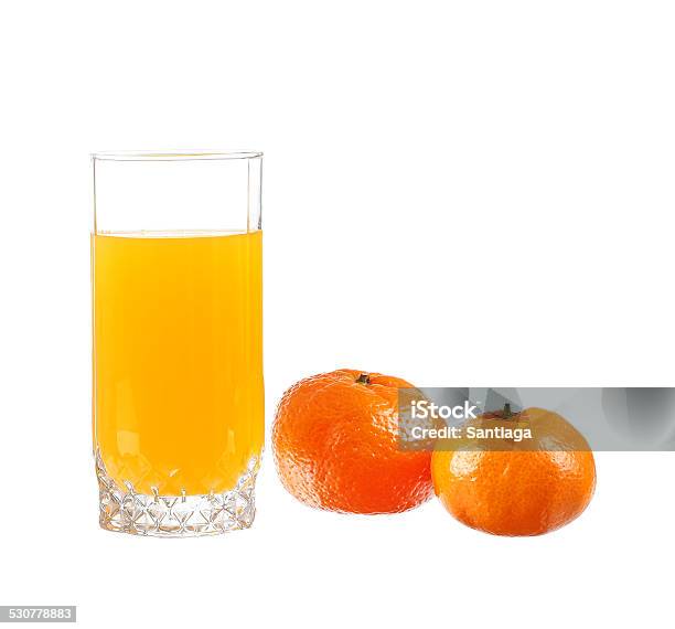 Orange Juice In A Glass With Lime Orange Tangerine Stock Photo - Download Image Now