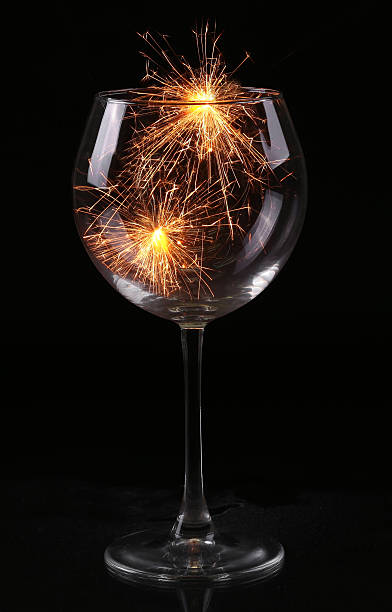 istock Wine glass with a sparkler. 530779165
