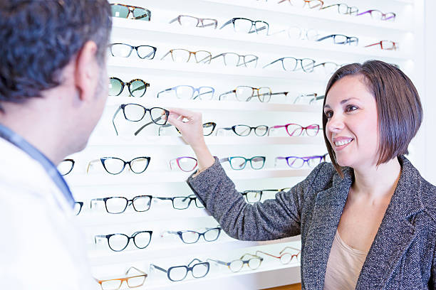 istock woman choosing glasses 530779565