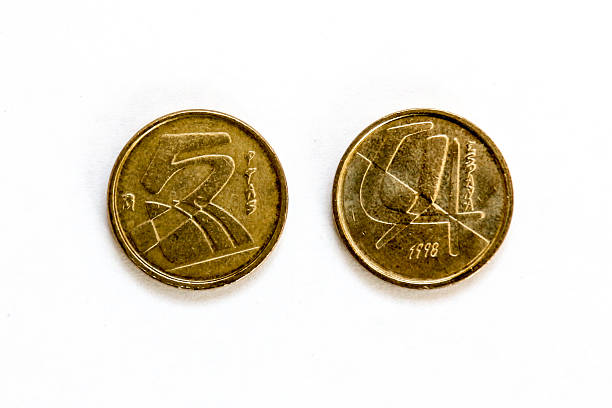 Five Spanish Peseta coin, front and back, isolated on white