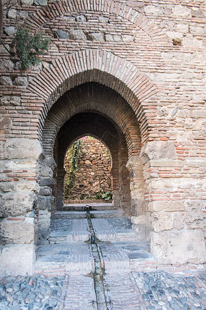 Corridor in wall Corridor in wall in Alcazaba in Málaga entrence stock pictures, royalty-free photos & images