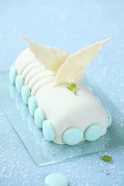 Christmas Yule Log decorated with Macarons