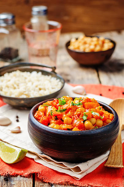 istock chickpeas carrots pepper coconut milk curry with brown rice 530810092