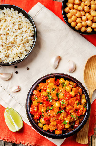 istock chickpeas carrots pepper coconut milk curry with brown rice 530810140