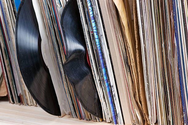 istock Retro styled image of a collection old vinyl record lp's 530810446