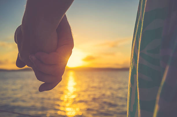 istock Couple of lovers holding hands 530812582