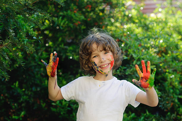 istock Happy young boy hugging at sunset 530813670
