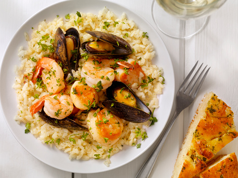 Seafood Risotto with Fresh Parsley and Focaccia Bread  -Photographed on Hasselblad H1-22mb Camera