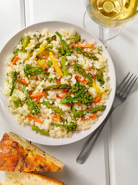 istock Vegetable Risotto with Fresh Parsley and Focaccia Bread 530814360