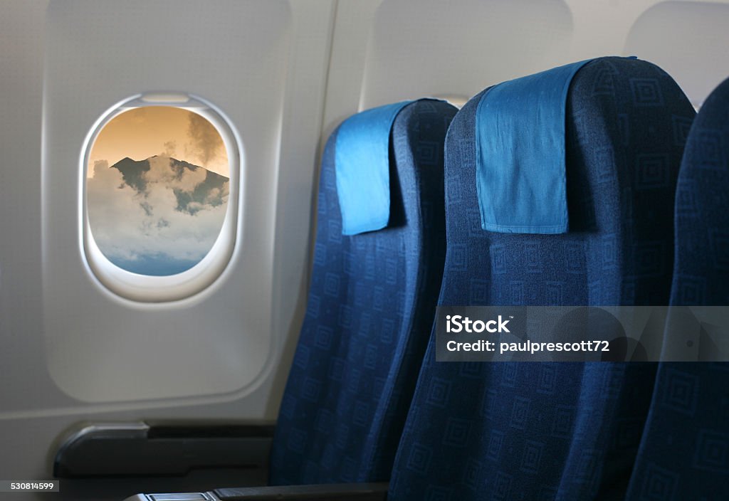 airplane seat and window Airplane seat and window inside an aircraft Air Vehicle Stock Photo