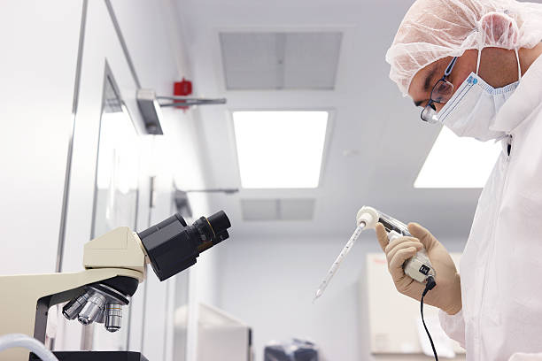 istock scientist in a clean room 530817560