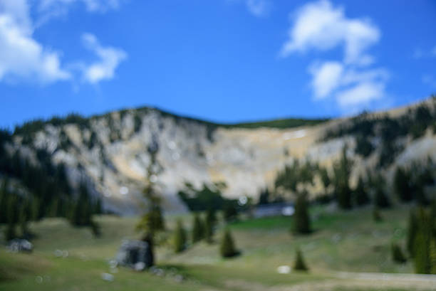 Limestone mountain with steep cliffs in Jiuzhaigou National Park.Jiuzhaigou valley was inscribed by UNESCO as a World Heritage Site in 1992 and a World Biosphere Reserve in 1997, Sichuan province, China.