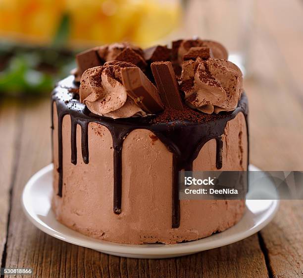 Chocolate Cake On Wooden Background Stock Photo - Download Image Now - Baked, Baked Pastry Item, Bakery