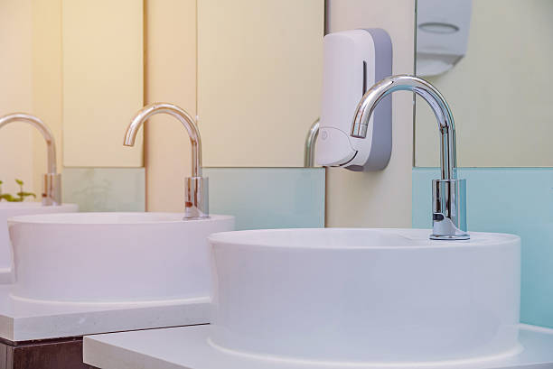 istock white basins in bathroom interior with granitic tiles 530822790