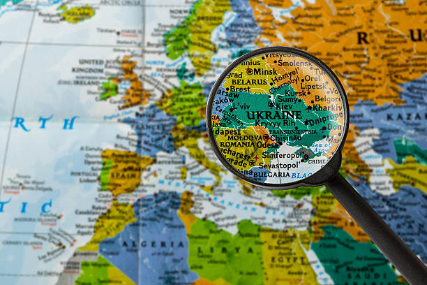 Map of Ukraine map of Ukraine through magnifying glass ukraine stock pictures, royalty-free photos & images