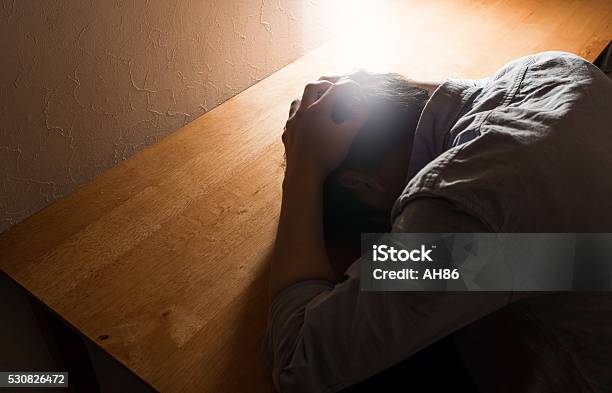 Depressed Asian Man Stock Photo - Download Image Now - Adult, Anxiety, Collapsing
