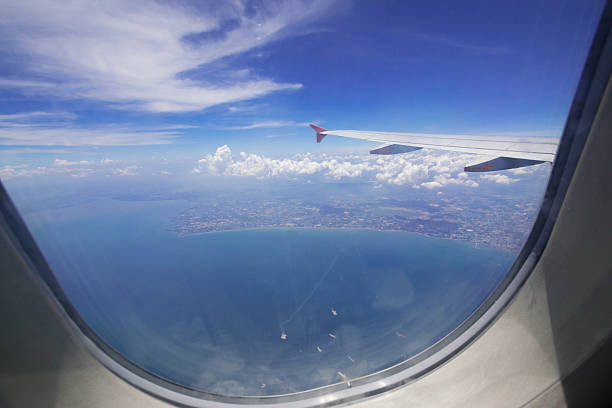 istock window aircraft during flight in wing with top view 530826674