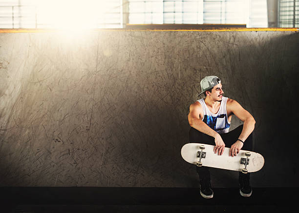 istock Man Skateboarder Lifestyle Relax Hipster Concept 530826808